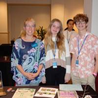 Student presenters with their teacher